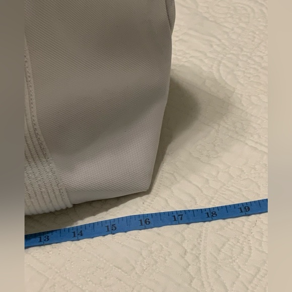 Lacoste OffWhite Large PreOwned Tote Bag inside clean outside blue light stains. - Picture 5 of 16